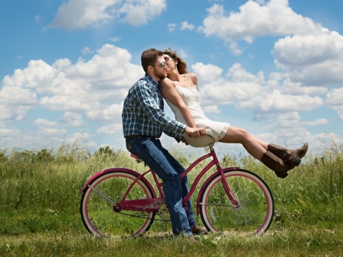 Couple on a bicycle